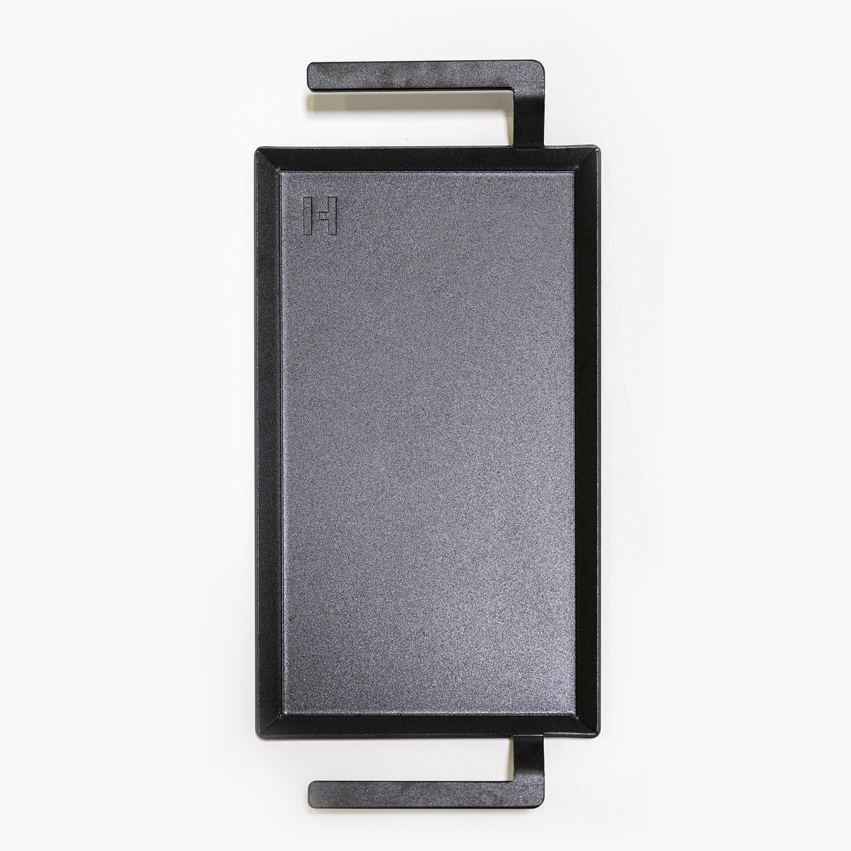 Carbon Steel Griddle Plate top view with integrated handles and embossed IH mark